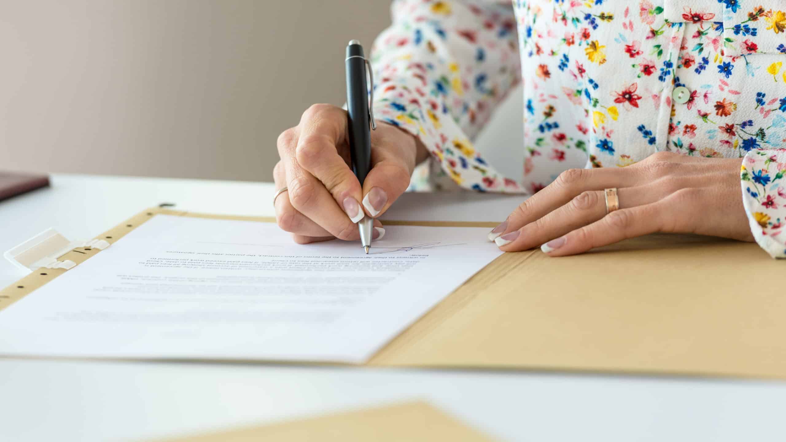 Businesswoman signing contract